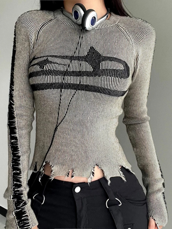 Darkest Star Distressed Knit Top. This top has a knit construction, long sleeves, front star graphic design, distressed hems and a cropped fit.