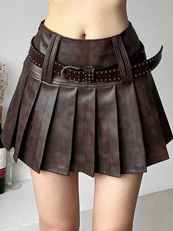 In The Moment Pleated Skirt. This mini skirt has a pleated vegan leather construction and a side zip closure.