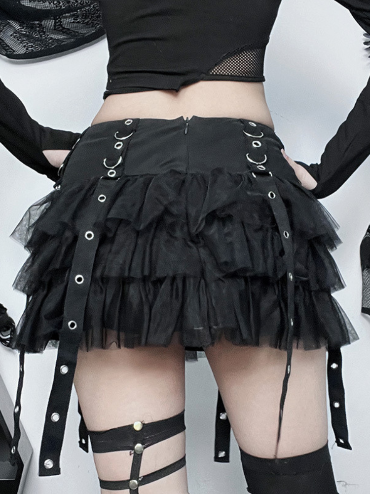 Stole Your Soul Ruffle Skirt. This mini skirt has a layered tiered ruffle construction, eyelet and buckle detailing and garter straps.