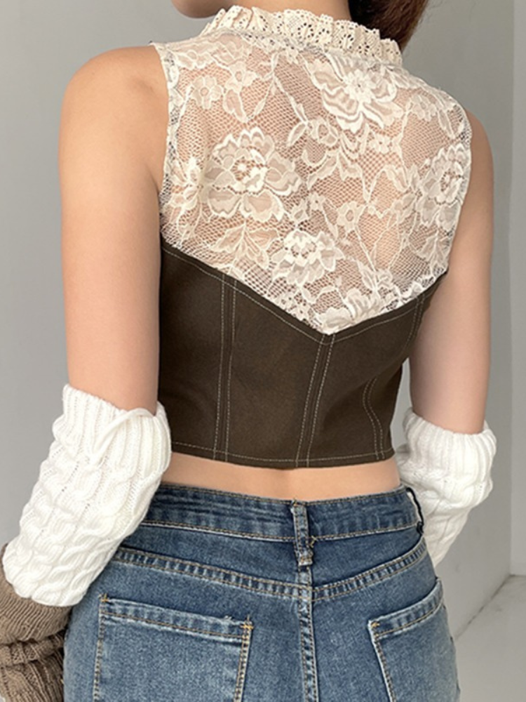Resident Of Earth Vest Top. This top comes with a scoop neckline with lace trim, button up closures, lace mesh on the back and a cropped fit.