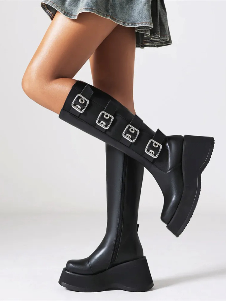 Got Me In Knee High Boots. These high knee boots have a vegan leather construction, platform soles, side zip closures, and buckle strap details all over.