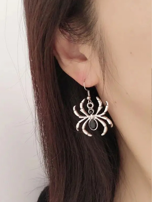 Be Afraid Spider Earrings have a drop construction with a metallic spider design.