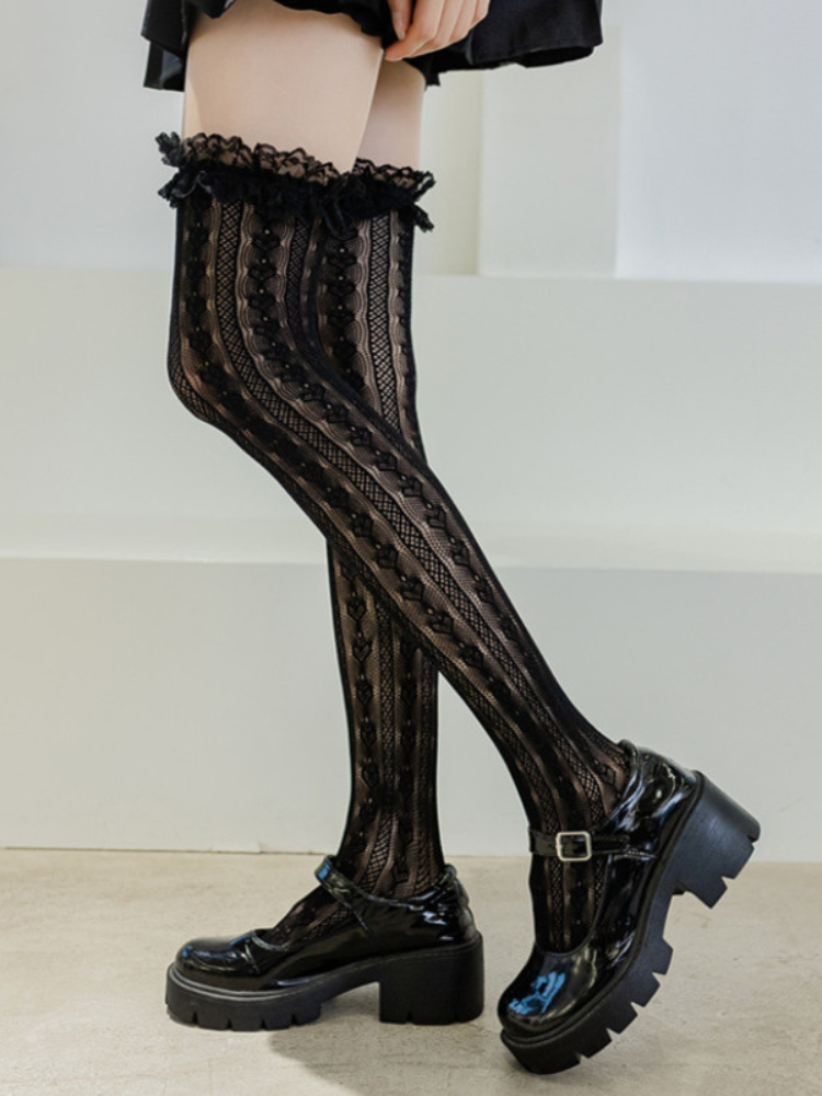 Found By You Thigh-High Socks. These thigh-high socks have a stretchy lace construction and ruffled cuffs.