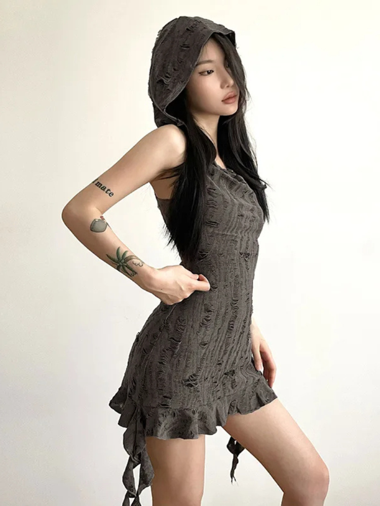 Mess Of Me Distressed Hooded Dress. This hooded dress has a distressed construction, a bodycon fit and a ruffled hem.