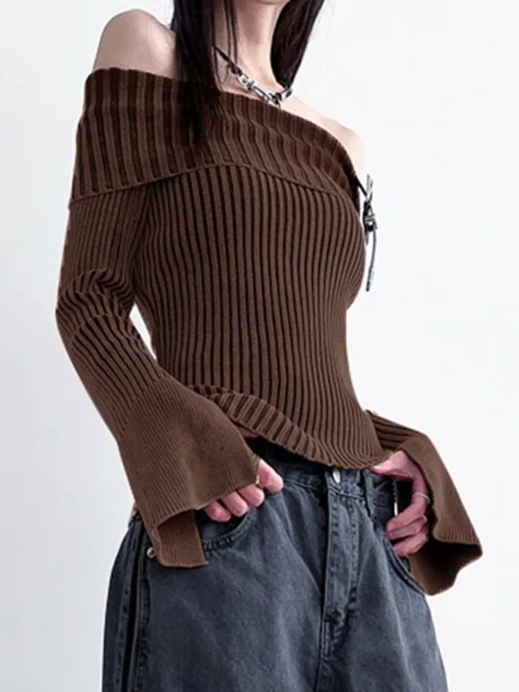 Down To Earth Off Shoulder Sweater. This sweater has a stretchy knit ribbed construction, an off the shoulder design, a belt closure design, long sleeves with cuts and an asymmetrical trim.