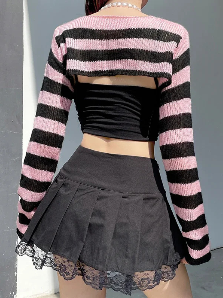 Darling Of Darkness Cropped Shrug. This shrug has a knit construction, a striped design, long sleeves and an ultra cropped fit.