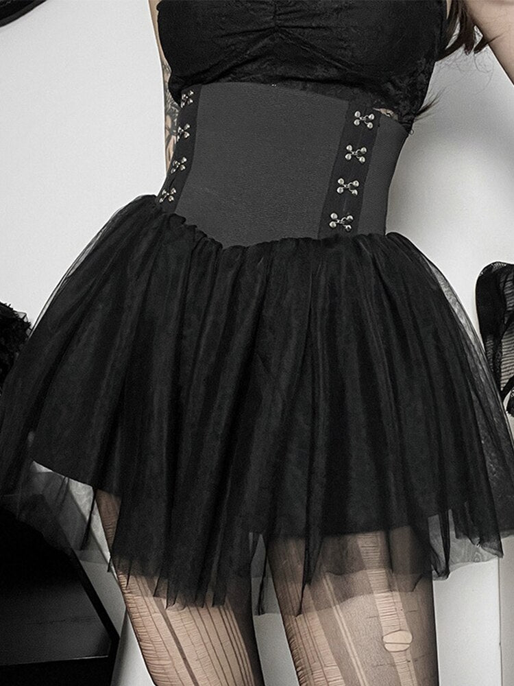 Sin In Disguise Tulle Skirt. This mini skirt features a layered tulle overlay and an elastic waist corset with hook and eye details.