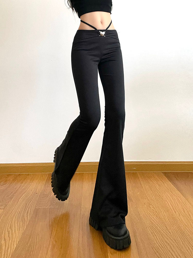 Cupid Strappy Flare Pants has a low waist fit, stretchy material, front waist heart buckle closure and drawstrings with back tie and a slim leg fit to flared leg opening.