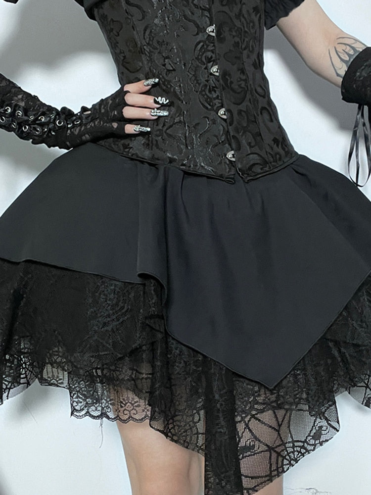 Royal Poison Mini Skirt. This high-waisted mini skirt has a layered sheer mesh construction with spider web details, an asymmetrical hem, and an elastic waistband.
