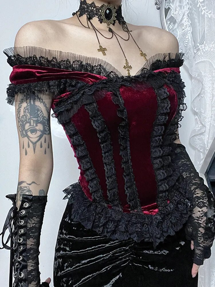 Bloody Valentine Corset Top. This corset top has a velvet construction, off shoulder straps and black lace trim.