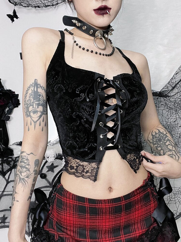 Mesmerize Me Corset Tank. This cropped corset top has a filigree velvet construction, lace trim hem and adjustable front lace-up ties.