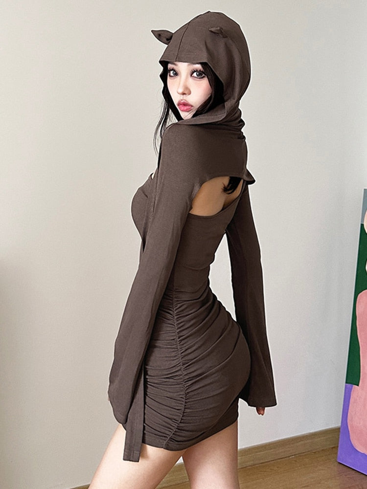 Here Kitty Hooded Mini Dress - Brown. This mini dress has stretchy ribbed construction, with one shoulder strap, matching shrug with draped hood and cat ears and long sleeves.