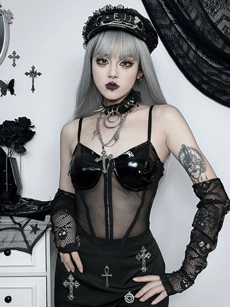 Sinfully Sacred Corset Top. This corset top has a vinyl and mesh construction, front hook and eye closures and adjustable straps.