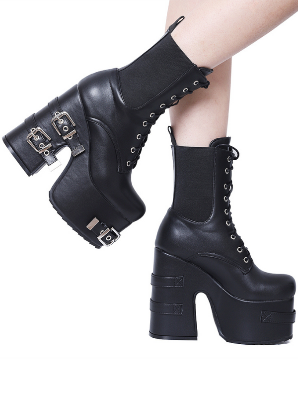 Bad Influence Platform Boots. These massive platform boots have a vegan leather construction, chunky block heels with buckle straps accents, front lace up closures and elastic side gussets.