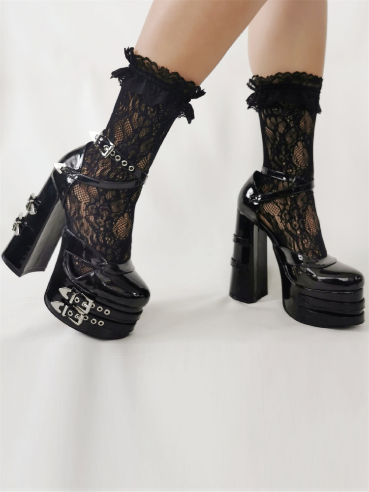Crush Your Soul Platform Sandals. These buckled platform sandals have a vegan patent leather construction, ankle buckle closures and chunky block heels with buckle straps accents.