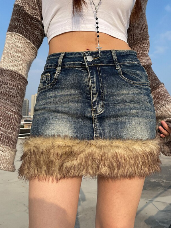 Generations After Denim Mini Skirt has a denim construction, a faux fur trim at the hem, a high rise waistline, and a bodycon fit.