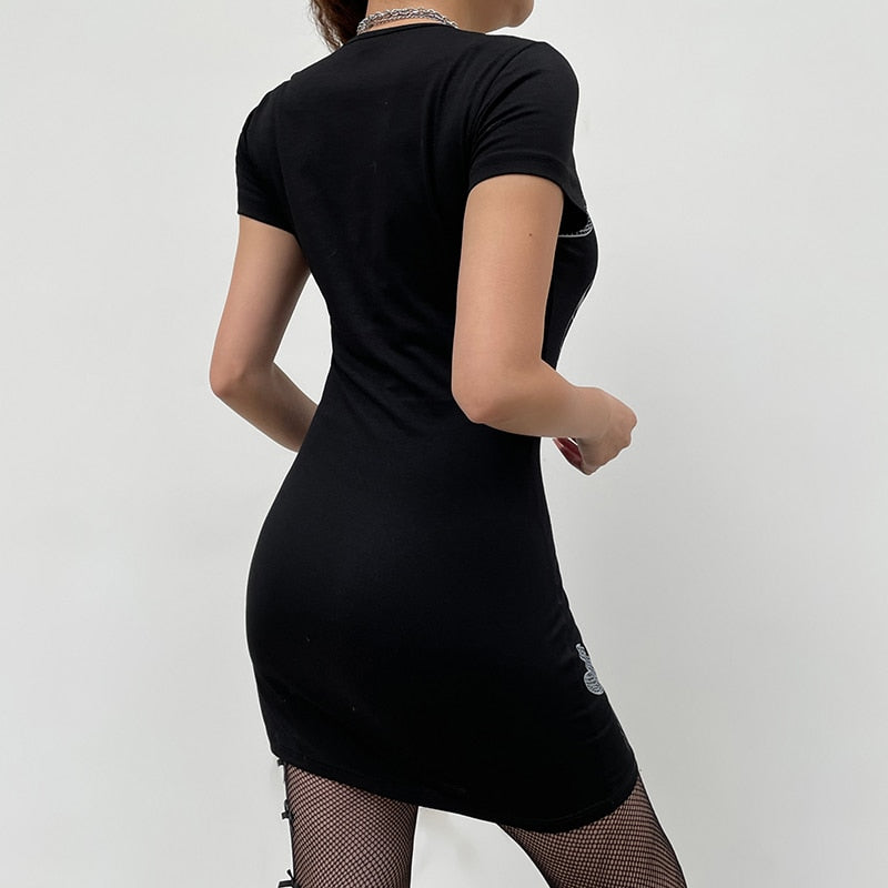 Cold To The Bones Dress. This black mini dress has short sleeves and freaky skeleton graphics on the front.