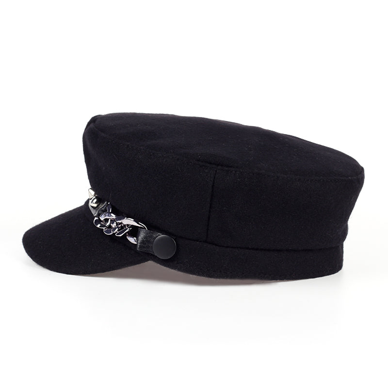 Baby Goth Boy Hat has a wool construction, a vegan leather strap around the brim with stud details and side chain.